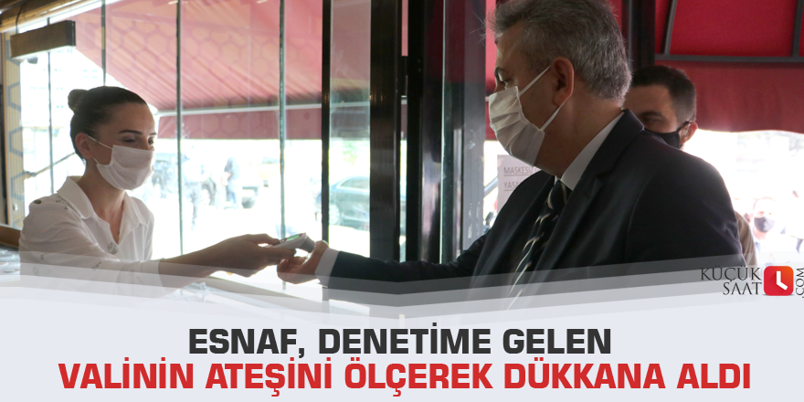 Esnaf, denetime gelen valinin ateşini ölçerek dükkana aldı