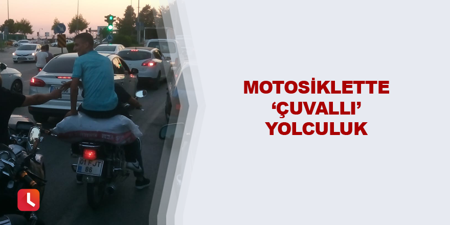 Motosiklette ‘çuvallı’ yolculuk