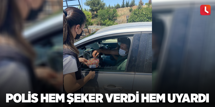 Polis hem şeker verdi hem uyardı