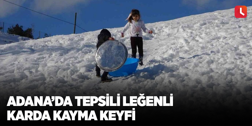 Adana’da tepsili leğenli karda kayma keyfi