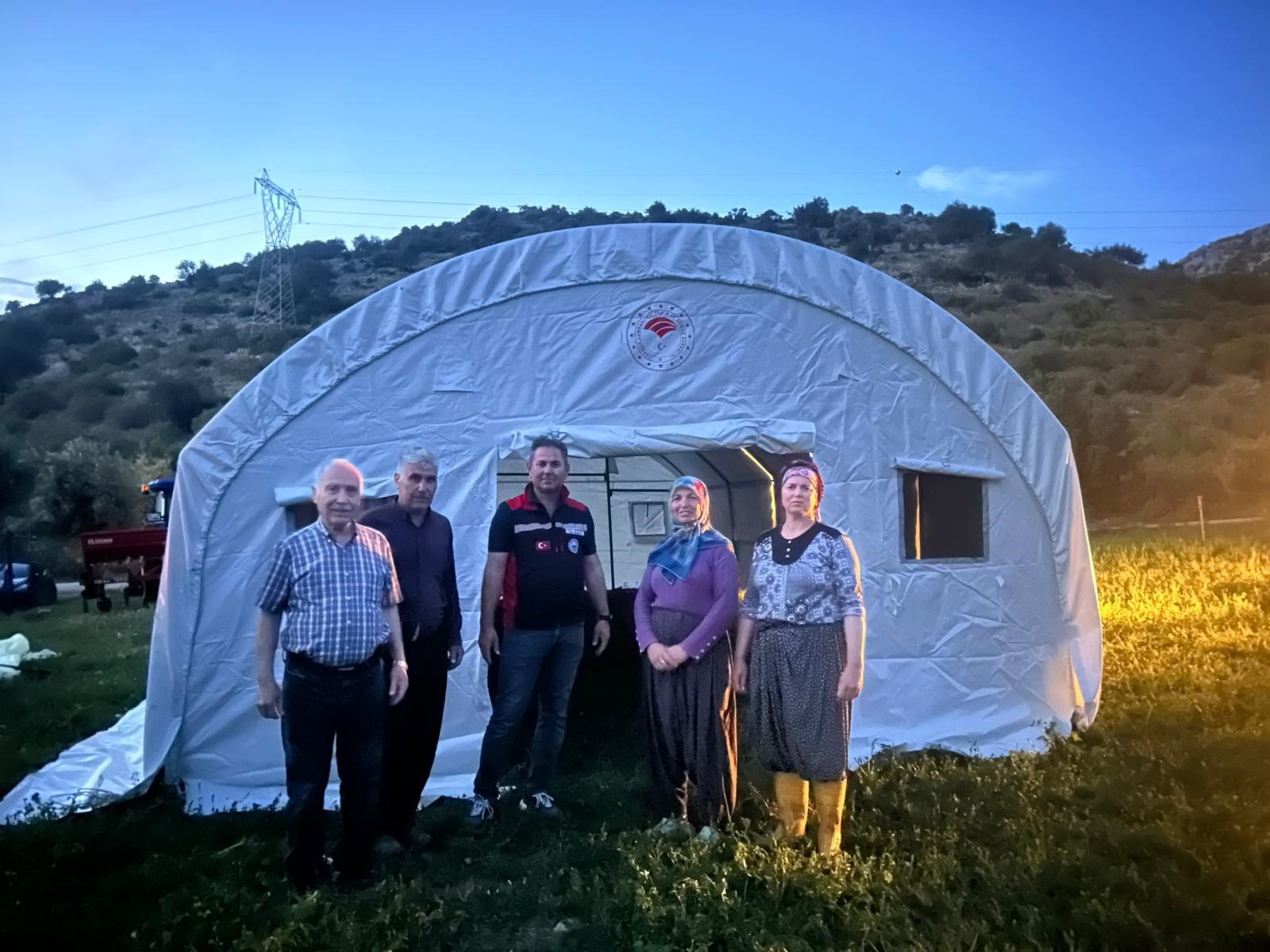 Kozan'da selden etkilenen vatandaşların yaraları sarılıyor