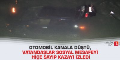 Otomobil kanala düştü, vatandaşlar sosyal mesafeyi hiçe sayıp kazayı izledi