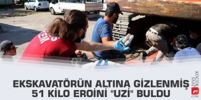 Ekskavatörün altına gizlenmiş 51 kilo eroini "Uzi" buldu