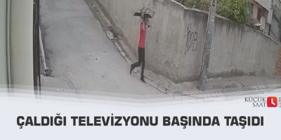 Çaldığı televizyonu başında taşıdı