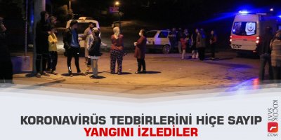 Koronavirüs tedbirlerini hiçe sayıp yangını izlediler