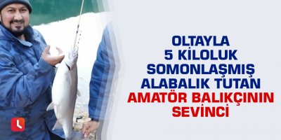 Oltayla 5 kiloluk somonlaşmış alabalık tutan amatör balıkçının sevinci