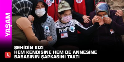 Şehidin kızı hem kendisine hem de annesine babasının şapkasını taktı