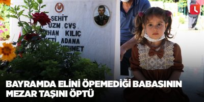 Bayramda elini öpemediği babasının mezar taşını öptü