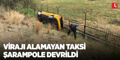 Virajı alamayan taksi şarampole devrildi