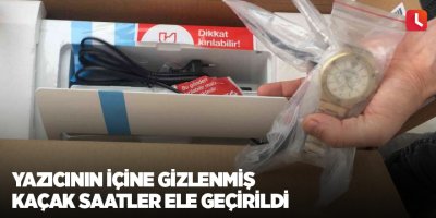 Yazıcının içine gizlenmiş kaçak saatler ele geçirildi
