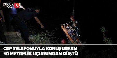 Cep telefonuyla konuşurken 50 metrelik uçurumdan düştü