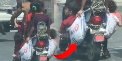 Adana’da Hindistan görüntüleri,çocukları çuvalla taşıdılar