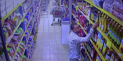 Ayçiçek yağını pantolonunun içine sokarak çaldı