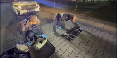 Adana'da yolcunun bavulundan 15 ruhsatsız tabanca çıktı