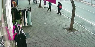 Çocuk kapkaççı güvenlik kamerasında