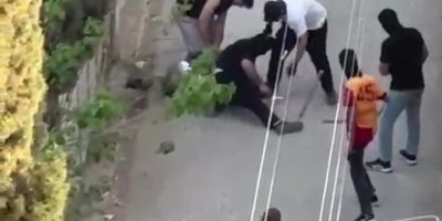 Kar maskeli şahıslar dehşet saçtı: Bir kişiyi sopayla dövüp kaçtılar