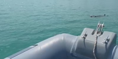 Adana'da baraj gölüne düşen kadını gemi adamlar kurtardı