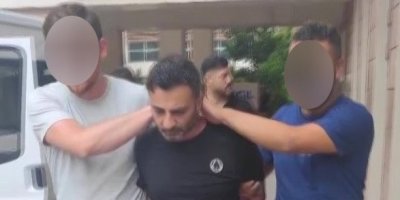 Firari katil, 18 yıl sonra çöp atarken aynı polislere yakalandı