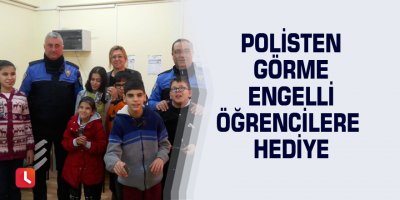 Polisten görme engelli öğrencilere hediye