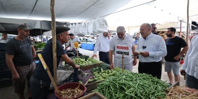 Yüreğir Belediye Başkanı Ali Demirçalı, Yenidoğan Semt Pazarı'nı ziyaret etti.