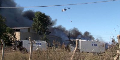 Adana'da geri dönüşüm fabrikasındaki yangına havadan ve karadan müdahale sürüyor