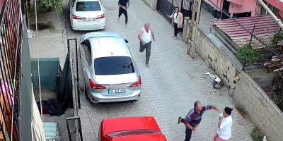 Kaçan şahsı tutmaya çalışan kadın yumruk yedi