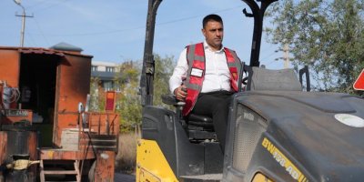 Başkan Kozay 100. Yıl Mahallesi’ndeki asfalt çalışmalarını inceledi