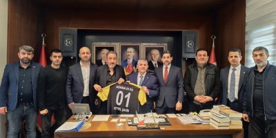 Adana 01 FK, Bucaspor 1928 deplasmanı öncesi MHP İzmir İl Başkanlığı’nı ziyaret etti