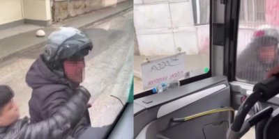 Trafikte tartıştığı servis aracının camını kaskıyla kırdı