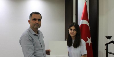 Kozan’ın LGS birincisi Şevval Kayhanlı'ya ödül
