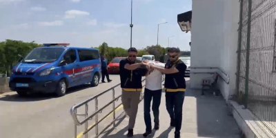 Yüreğir'de kadın kılığına girip iş yerine kurşun yağdıran şüpheli tutuklandı