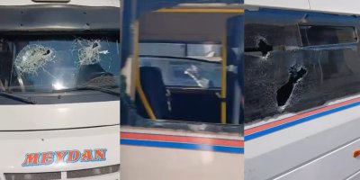 Dolmuş şoförünü darbedip aracın camlarını sopayla kırdı