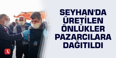 Seyhan'da üretilen önlükler pazarcılara dağıtıldı