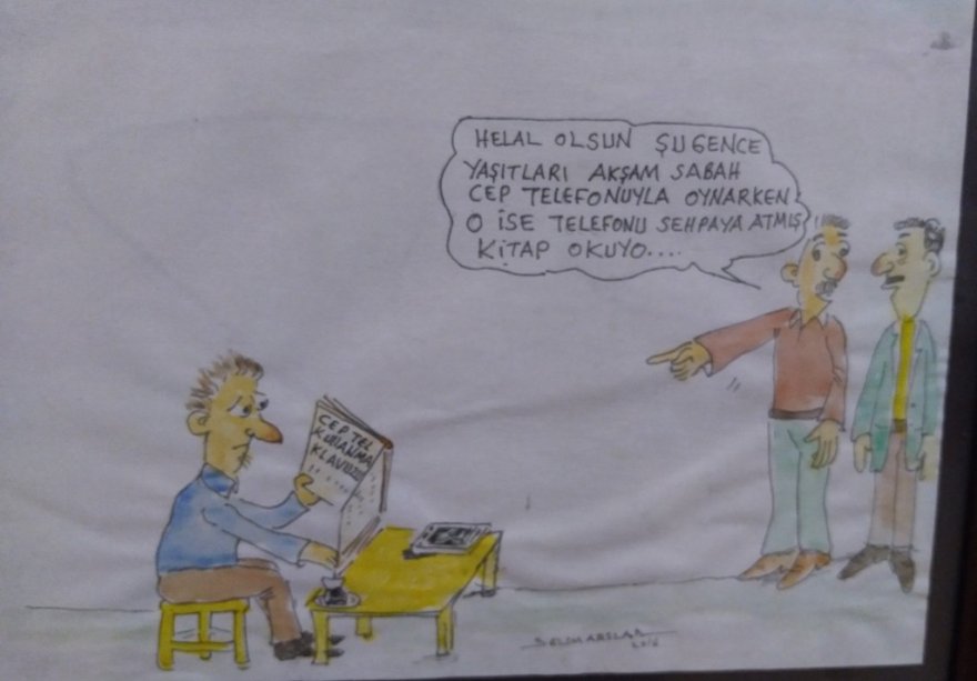 Kütüphane müdürü Arslan 26. karikatür sergisini açtı