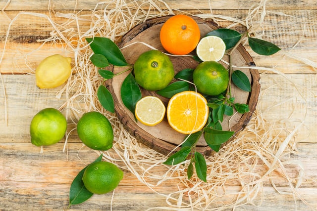 limes-oranges-tangerines-wooden-plate-1-min.jpg